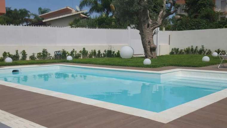 Poolside Area Design with Unique Lighting