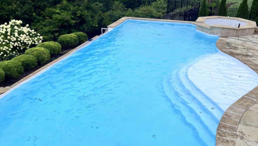 Pool-after-restoration-filled-with-water Pool After Restoration Filled With Water