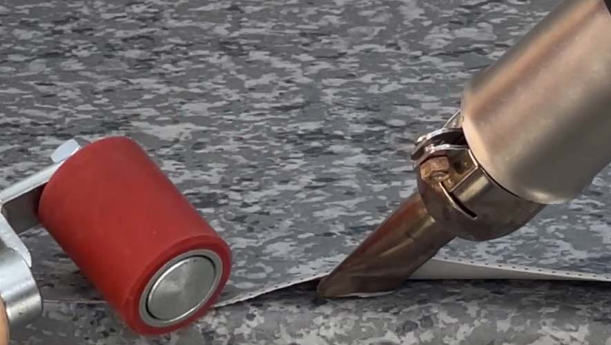 Sakko-Pool-construction-company-welding-membrane-strips-with-a-heat-gun Sakko-Pool-construction-company-welding-membrane-strips-with-a-heat-gun